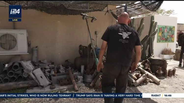 Israeli resident Yaron Bob showing i24NEWS how he repurposes rocket debris from Gaza into art, turning trauma into healing
