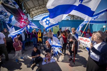 Activists protest against United Nations Relief and Works Agency for Palestine Refugees (UNRWA) outside their offices in Jerusalem, March 20, 2024.