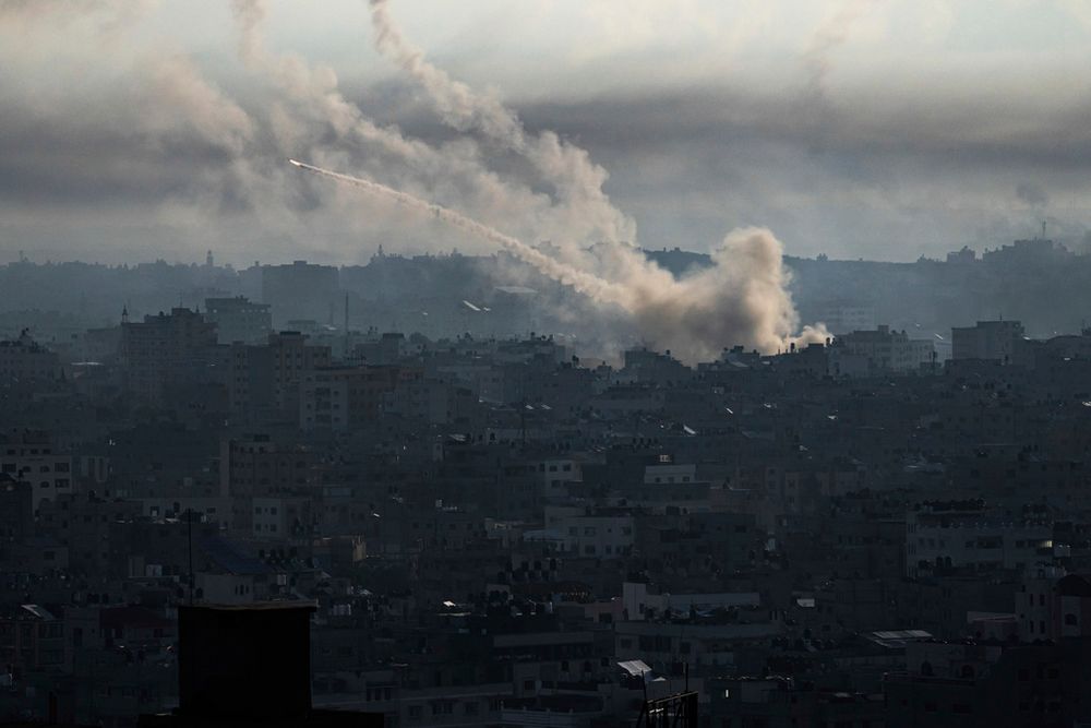 Rockets are fired toward Israel from the Gaza Strip, Saturday, Oct. 7, 2023.