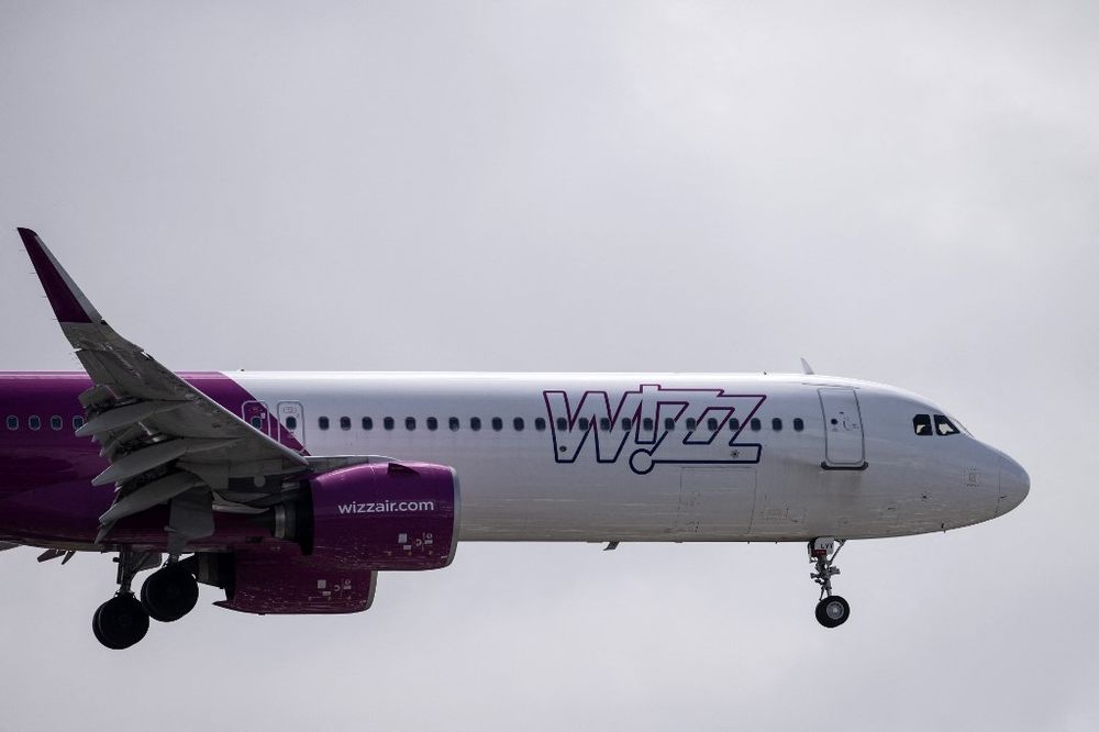 A Wizz Air jet comes in to land at Gatwick Airport, south of London.