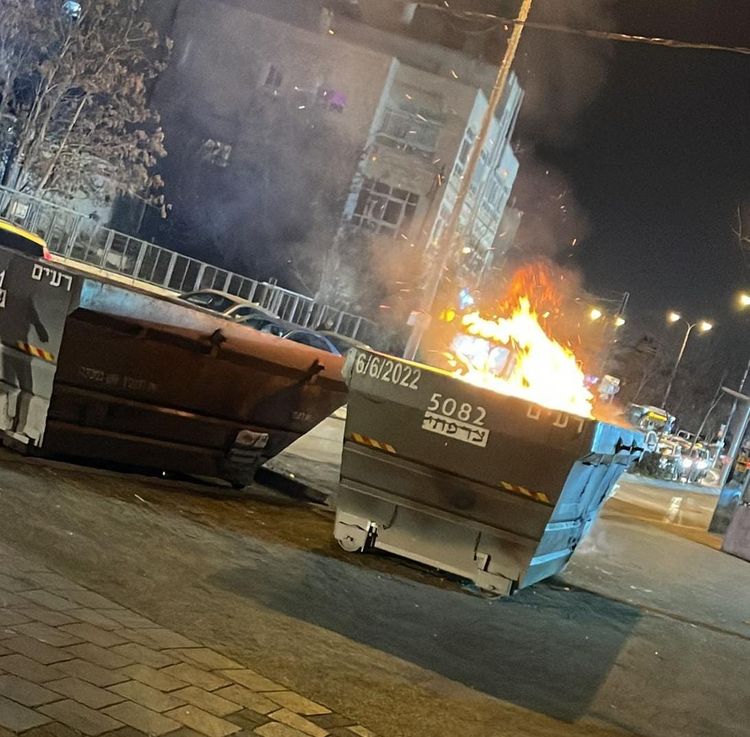 Garbage bins torched by Palestinian rioters in east Jerusalem.