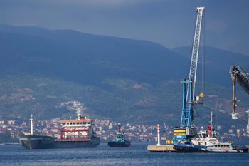 The cargo ship Polarnet, left, arrives to Derince port in the Gulf of Izmit, Turkey.