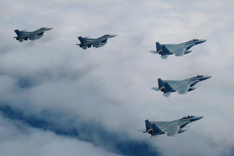 Japanese and U.S. joint fighter jets fly over the Sea of Japan.