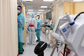 Medics in safety gear work in the coronavirus ward of Sha'are Zedek hospital in Jerusalem, Israel on January 20, 2022.