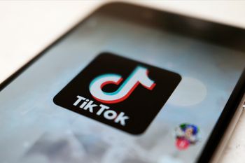 FILE - This file photo shows as logo of a smartphone app TikTok on a user post on a smartphone screen in Tokyo, Japan.