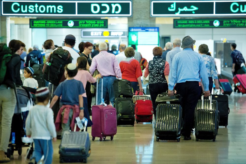 Travelers in the arrivals hall of Ben Gurion International Airport, near Tel Aviv.