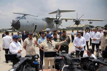 Indonesian President Prabowo Subianto talks to journalists after the inauguration ceremony of the newly arrived Indonesian Air Force's Airbus A400M military cargo plane at Halim Perdanakusuma Air Base in Jakarta, Indonesia, Monday, Nov. 3, 2025.