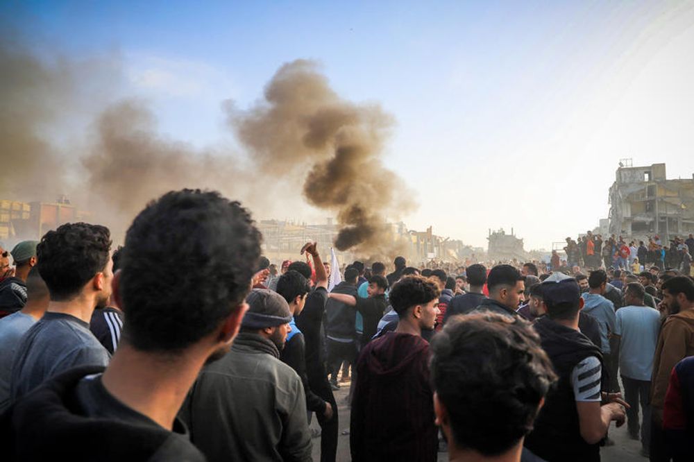 Palestinians take part in an anti-Hamas protest, calling to end the war with Israel, in Beit Lahiya, in the northern Gaza Strip

