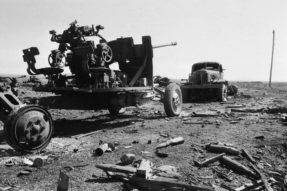 A destroyed Soviet-made Syrian 57mm anti-aircraft gun and ZIL truck are abandoned on the Syrian front lines on the Golan Heights, two weeks after the beginning of the Yom Kippur War in October 1973.