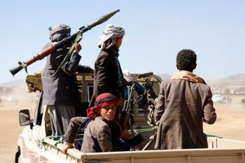 Houthis staging a rally against the U.S. and the U.K. strikes on Houthi-run military sites near Sanaa, Yemen.