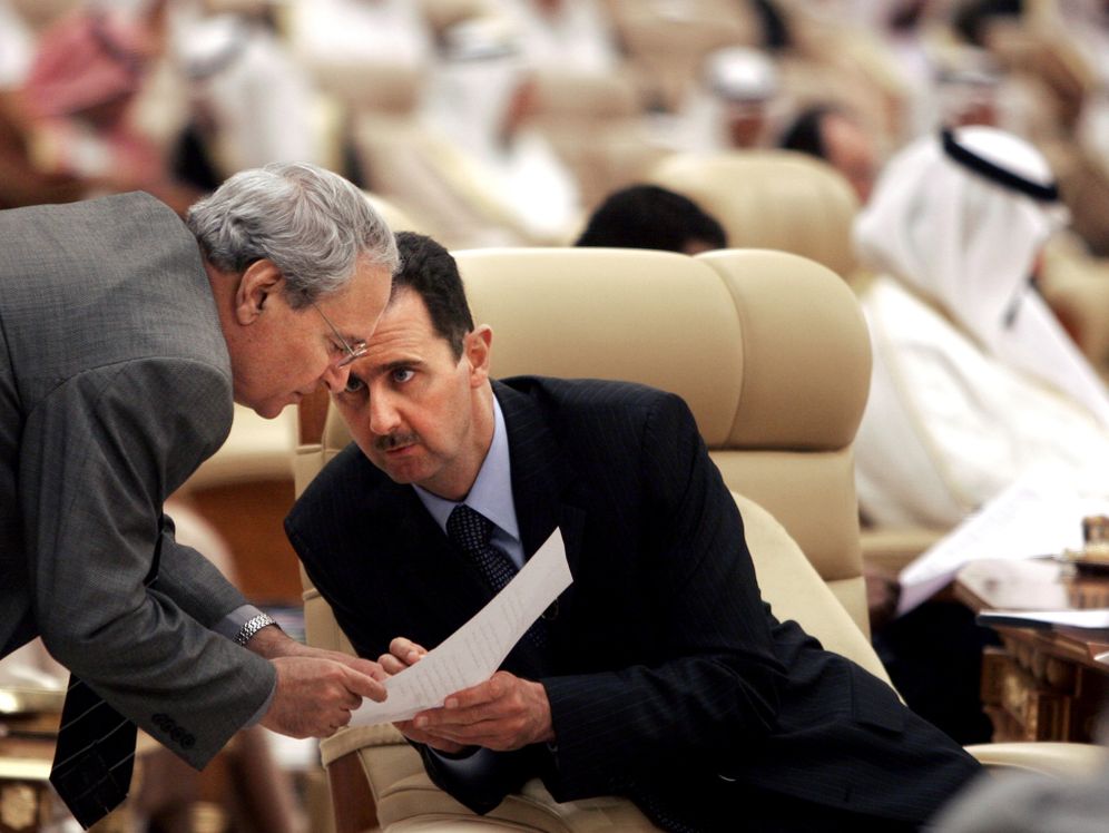 Syrian President Bashar Assad, right, talks to his vice President Farouk al-Sharaa during the Arab summit in Riyadh, Saudi Arabia, Thursday, March 29, 2007