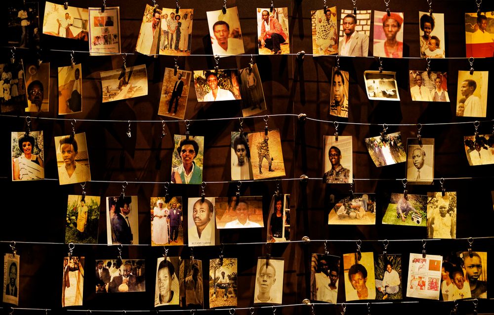 Family photographs of some of those who died hang on display in an exhibition at the Kigali Genocide Memorial Center in Kigali, Rwanda, on April 5, 2019.