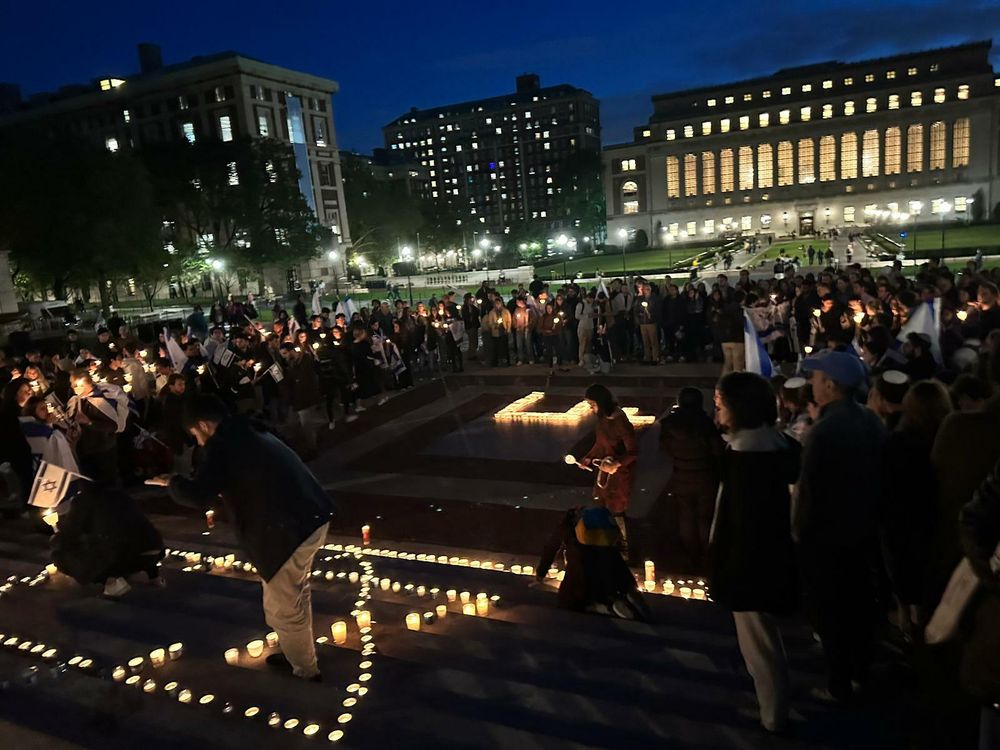 Students hold a vigil following Hamas' attack on Saturday on the campus of Columbia University, New York.