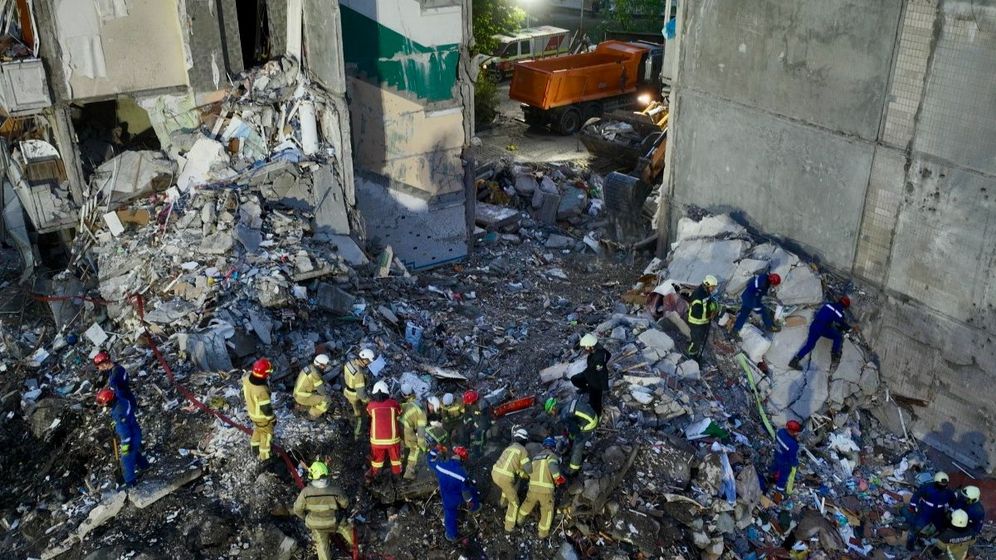 The State Emergency Service of Ukraine Rescuers continue to clear the rubble and search for people following Russian drone strike in Kyiv.