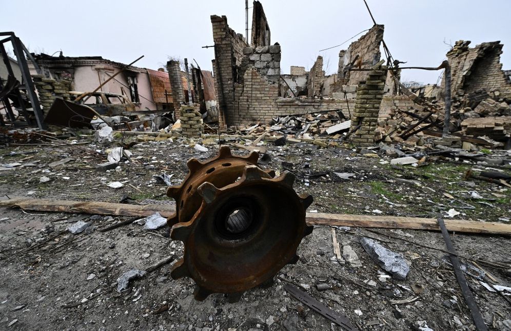Debris of destroyed armored vehicles is seen on a street in the town of Bucha, on the outskirts of the Ukrainian capital Kyiv on April 5, 2022.