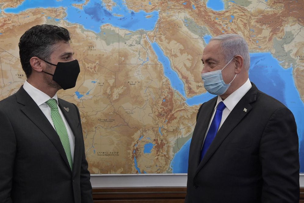 Israeli Prime Minister Benjamin Netanyahu meets the UAE's first ambassador to Israel Muhammad Mahmoud Al Khajah in Jerusalem on March 2, 2021.