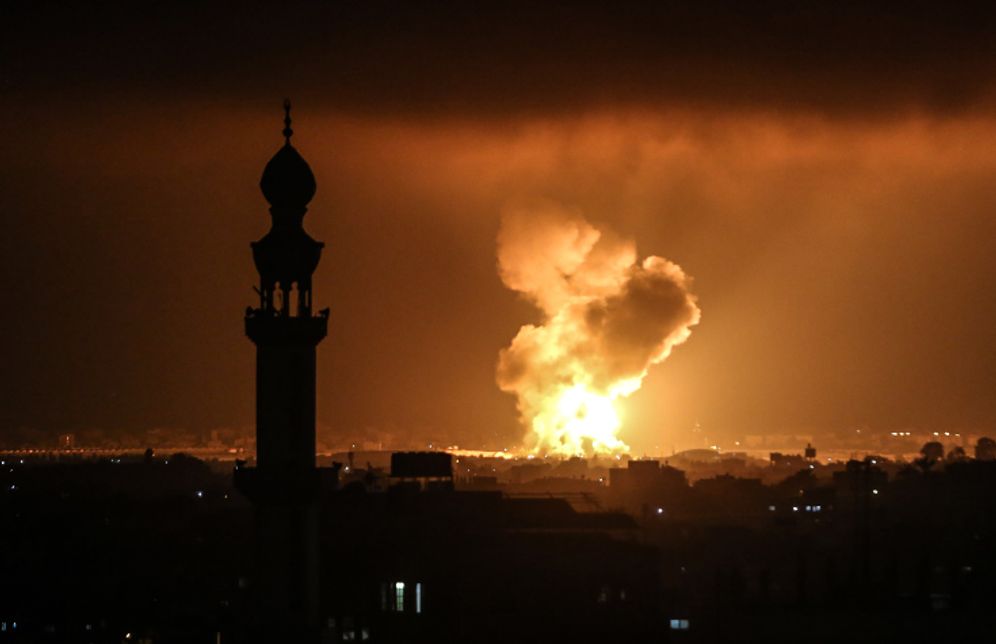 Abed Rahim Khatib/Flash90 Smoke and flames rise after an Israeli airstrike in a site of the Izz al-Din al-Qassam Brigades, the armed wing of Hamas, in the west of Khan Yunis, in the southern Gaza Strip, on May 11, 2021.