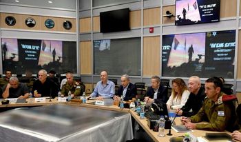 Israel's war cabinet, including Israeli Prime Minister Benjamin Netanyahu (C), Defense Ministry Yoav Gallant and Minister Benny Gantz, during a meeting with heads of the security forces.
