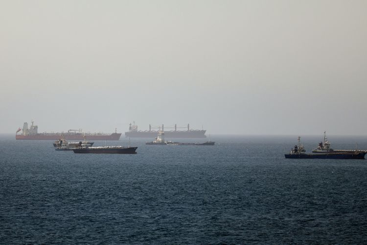 Tankers and cargo vessels are seen in the Gulf of Oman, along shipping routes linking the Strait of Hormuz and the Arabian Sea, Tuesday, June 16, 2026. 
