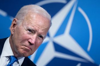 US President Joe Biden looks on ahead of a meeting with NATO Secretary General Jens Stoltenberg during the NATO summit in Madrid, on June 29, 2022.