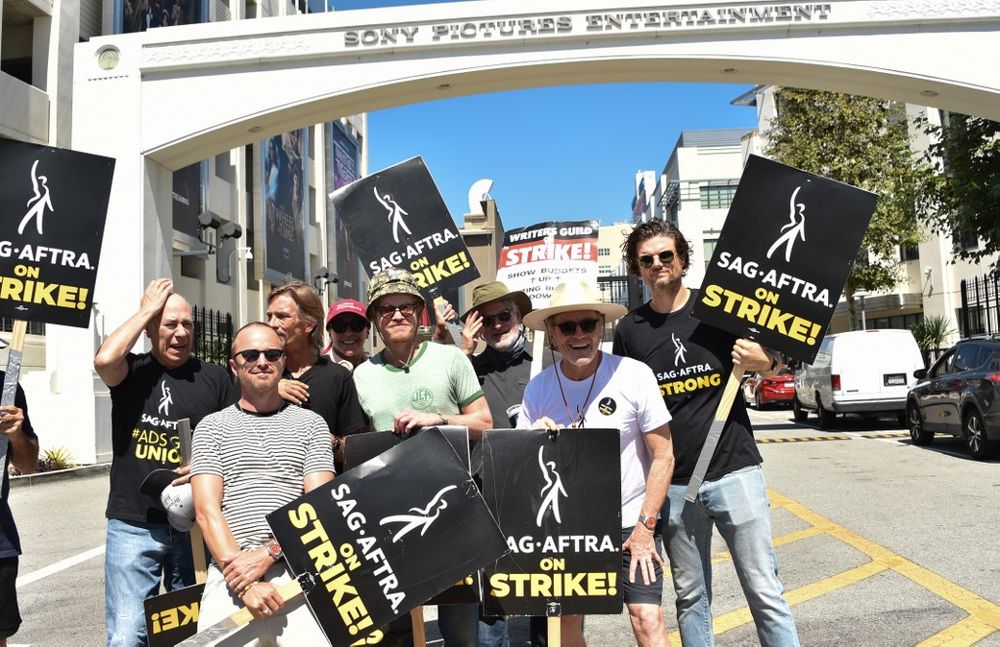 Breaking Bad actors Bryan Cranston and Aaron Paul rallied in favor of a strike in Hollywood