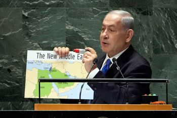 Israel's Prime Minister Benjamin Netanyahu holds his map of "The New Middle East" and a red marker pen as he addresses the 78th session of the United Nations General Assembly.