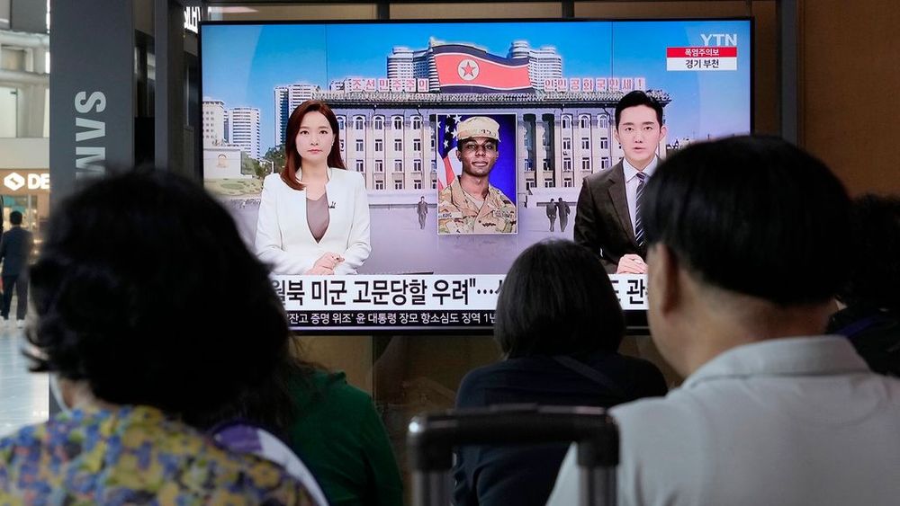 A TV screen shows a file image of American soldier Travis King during a news program at the Seoul Railway Station in Seoul, South Korea.