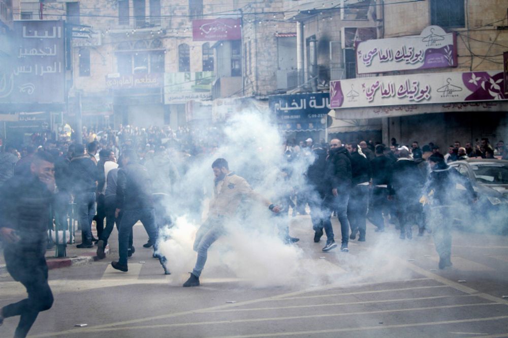 Palestinians rioting in the West Bank city of Nablus.