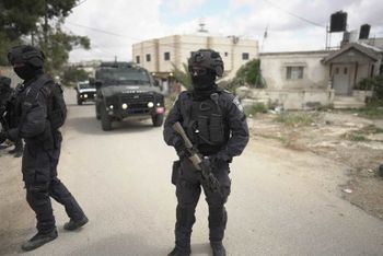 Israel Police special forces deployed at the scene of the car ramming in Hebron