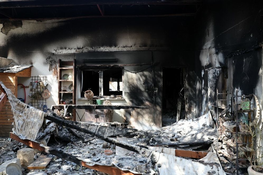 Charred remains of personal belongings lie inside the kibbutz Nir Oz along the border with the Gaza Strip on October 19, 2023, following the October 7 attack by Hamas.