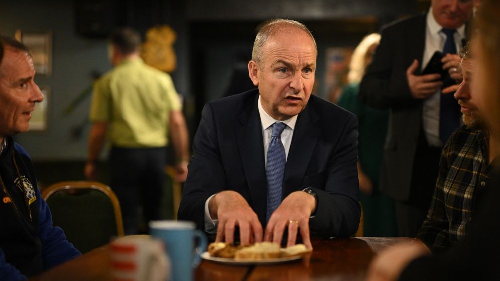 Ireland's Prime Minister Micheal Martin speaks to members of the community during a visit to the Brian Boru Irish Club in Ashton-in-Makerfield, northern England, Friday, Sept. 18, 2026. 
