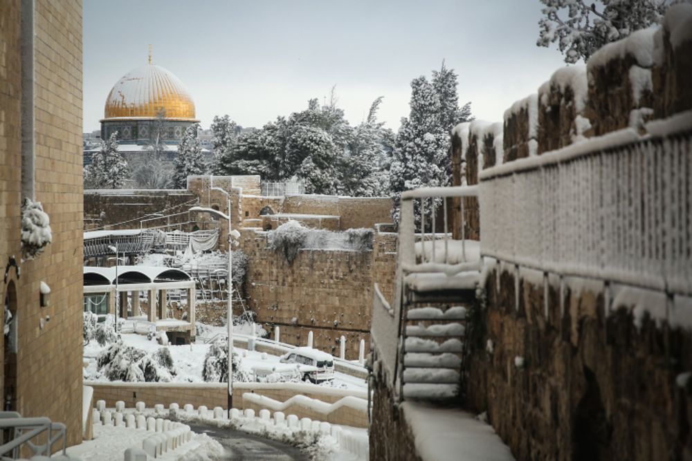 View of the Al Aqsa Mosque in Jerusalem's Old City, on a snowy winter morning. February 20, 2015