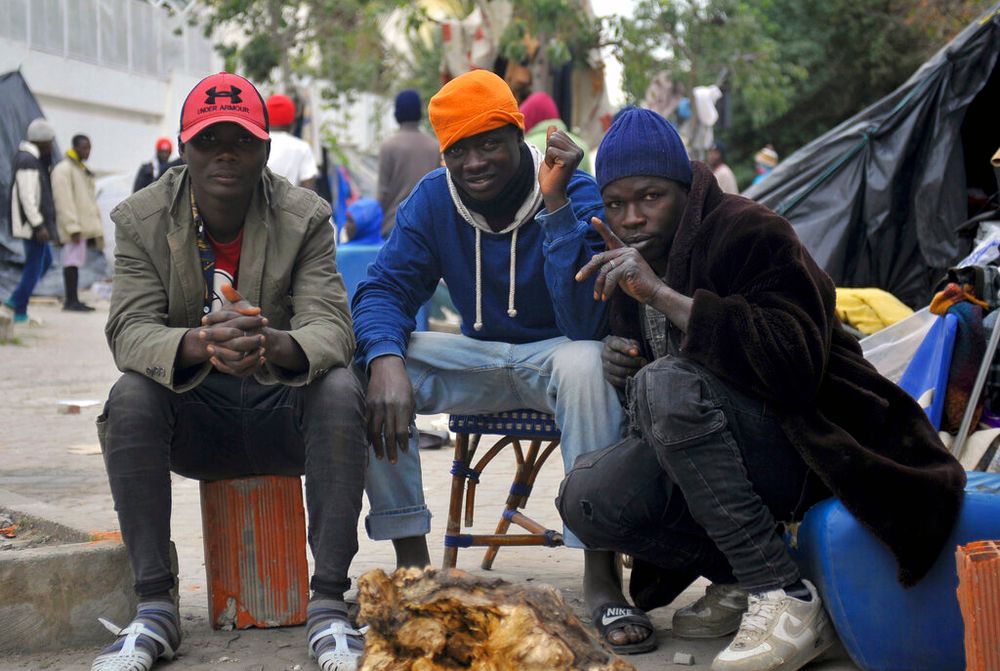 Sub-saharan migrants camp in front of the International Organization for Migration office in Tunis, Tunisia.