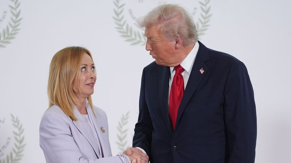 AP Photo/Evan Vucci, Pool President Donald Trump greets Italy's Prime Minister Giorgia Meloni