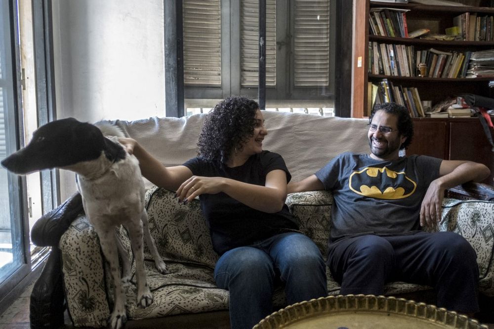 Egyptian activist and blogger Alaa Abdel Fattah (R) next to his sister Mona Saif at their home in Cairo, Egypt, on May 17, 2019.