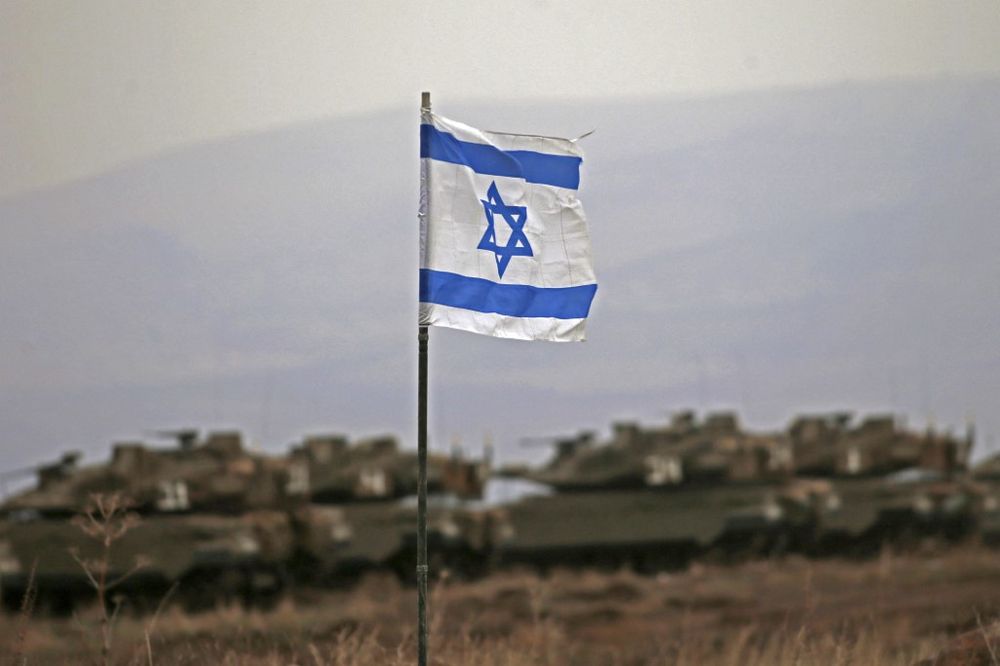 Israeli tanks are seen during a military drill near Ramat Trump settlement in the Golan Heights of northern Israel, on December 7, 2021.