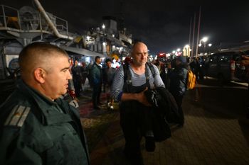 A crew member of the Liberian-flagged container ship Contship Jet, which was attacked by drones, is evacuated and transported to the port of Varna, Bulgaria, aboard the Bulgarian Navy rescue ship "Proteo", late Wednesday, Oct. 28, 2026.