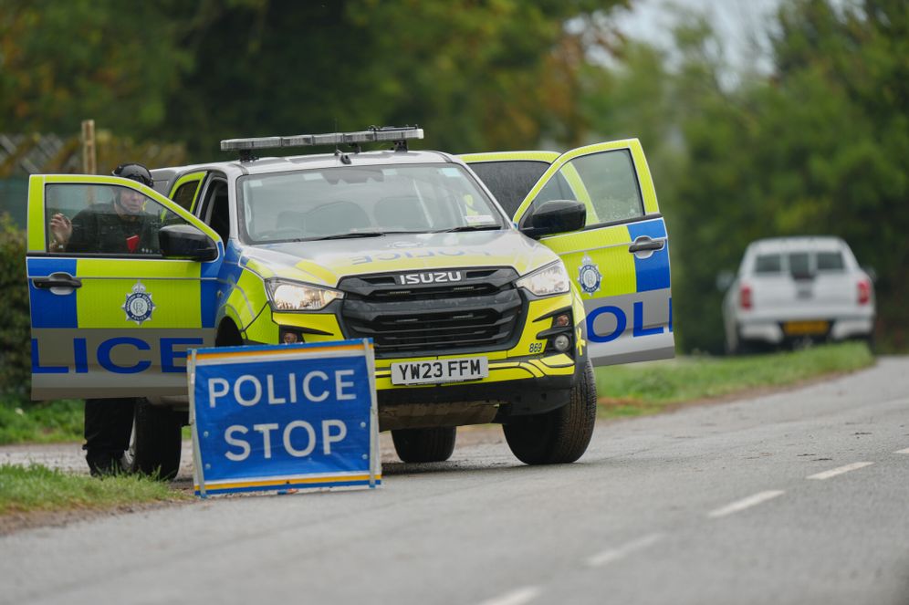 (AP Photo/Alastair Grant) Police guard a road leading to RAF Fairford, a US Airbase, after an incident in Fairford, England , Sunday, Sept. 27, 2026.