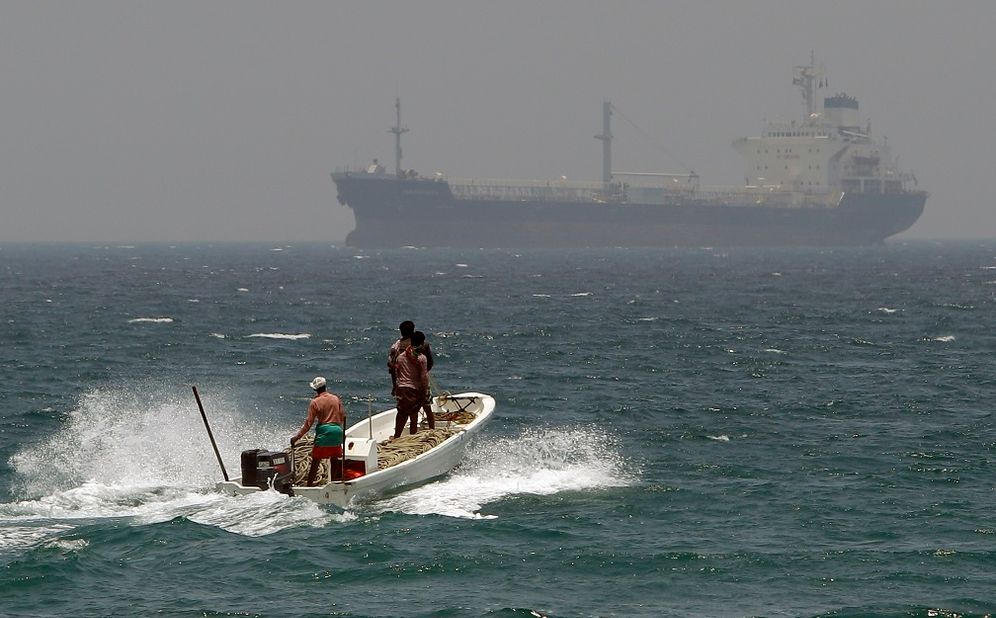 FILE - In this May 30, 2012, file photo, fishermen cross the sea waters off Fujairah, United Arab Emirates, near the Strait of Hormuz.