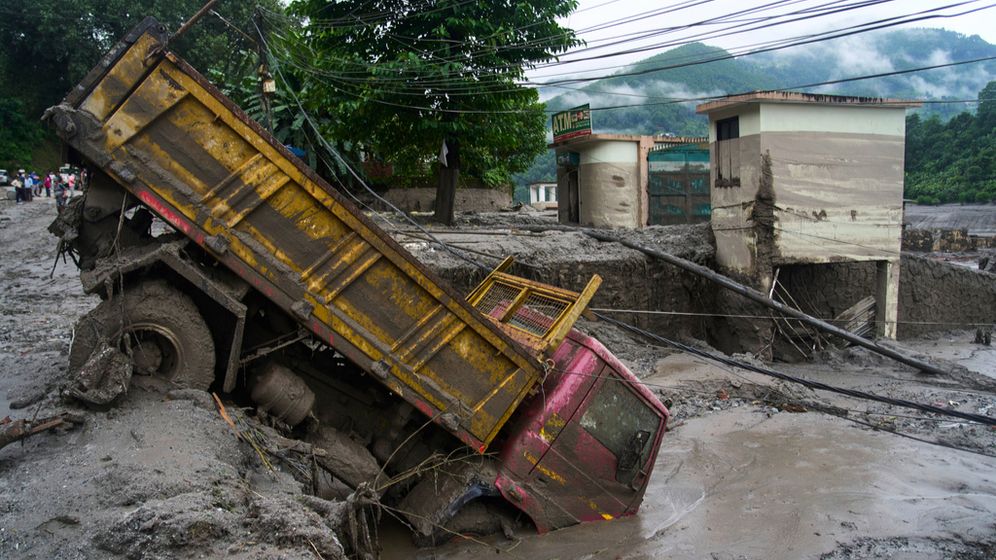 AP Photo/Niranjan Shrestha Inondations au Népal, août 2026