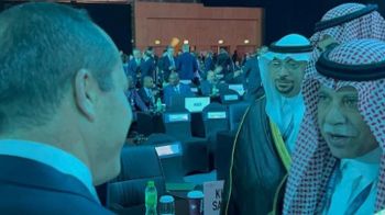 Israel's Economy Minister Nir Barkat meets his Saudi counterpart, Majid bin Abdullah Al-Qasabi, during a WTO conference in the UAE.