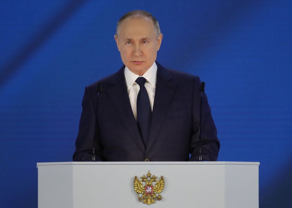 Russian President Vladimir Putin delivers his annual state of the nation address at the Federal Assembly at the Manezh Exhibition Hall in Moscow on April 21, 2021.