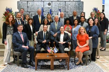 Israeli President Isaac Herzog and the First Lady Michal (C), during a meeting with U.S. lawmakers in Israel.