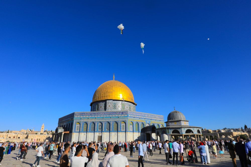 Thousands of Palestinians attend prayers at the Al Aqsa Mosque, in Jerusalem's Old City on July 9, 2022.
