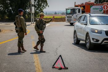 Israeli soldiers on a road near the border with the Gaza Strip, in southern Israel, on August 2, 2022.