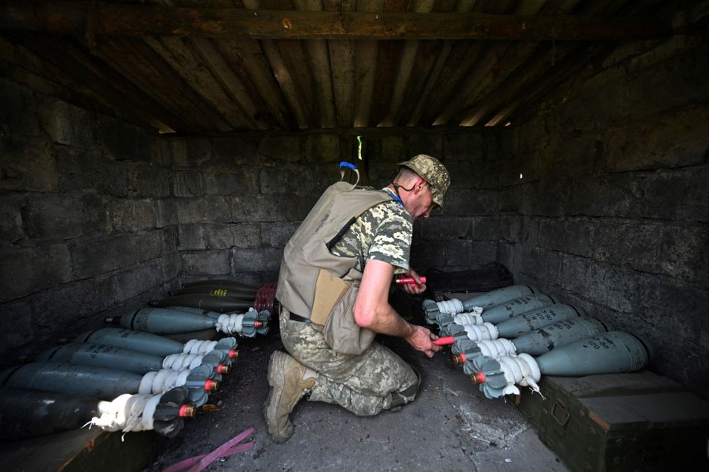 A Ukrainian marine of the 35th Brigade prepares 120mm mortar ammunition in the recently liberated village of Storozheve in the Donetsk region, Ukraine.