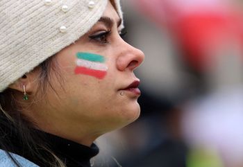 A protester attends a gathering marking the 44th anniversary of the Iranian revolution, in Trafalgar Square, central London, in the UK.