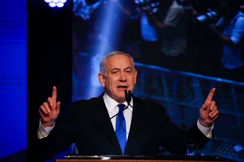 Israeli Prime Minister Benjamin Netanyahu addressees his supporters at party headquarters after elections in Tel Aviv, Israel, Wednesday, Sept. 18, 2019.