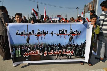 Iraq's residents and families of victims protest to demand the execution of those convicted of "terrorism" in Nasiriyah, Iraq, on January 26, 2021