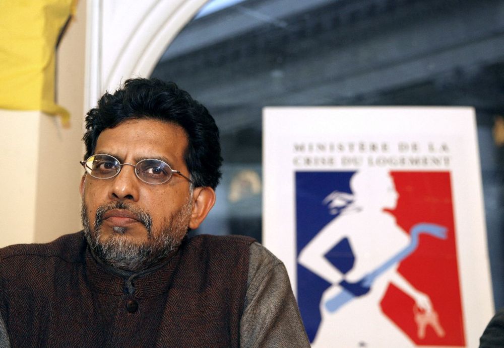 Miloon Kothari, then UN Special Rapporteur on the Right to Adequate Housing, attends a press conference in Paris, France, on January 29, 2007.